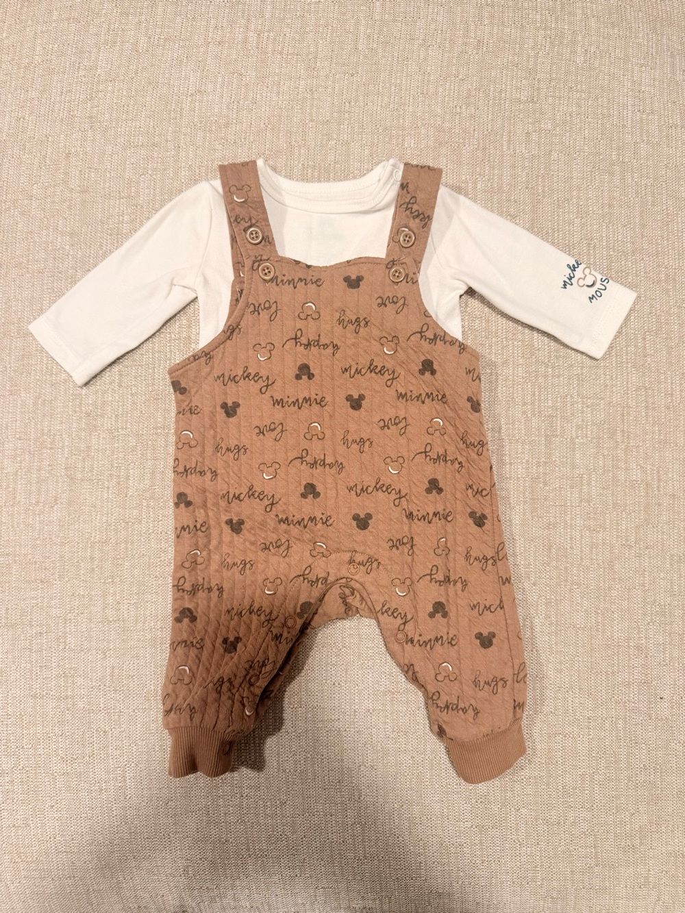 Disney White Baby Bodysuit with Green Logo